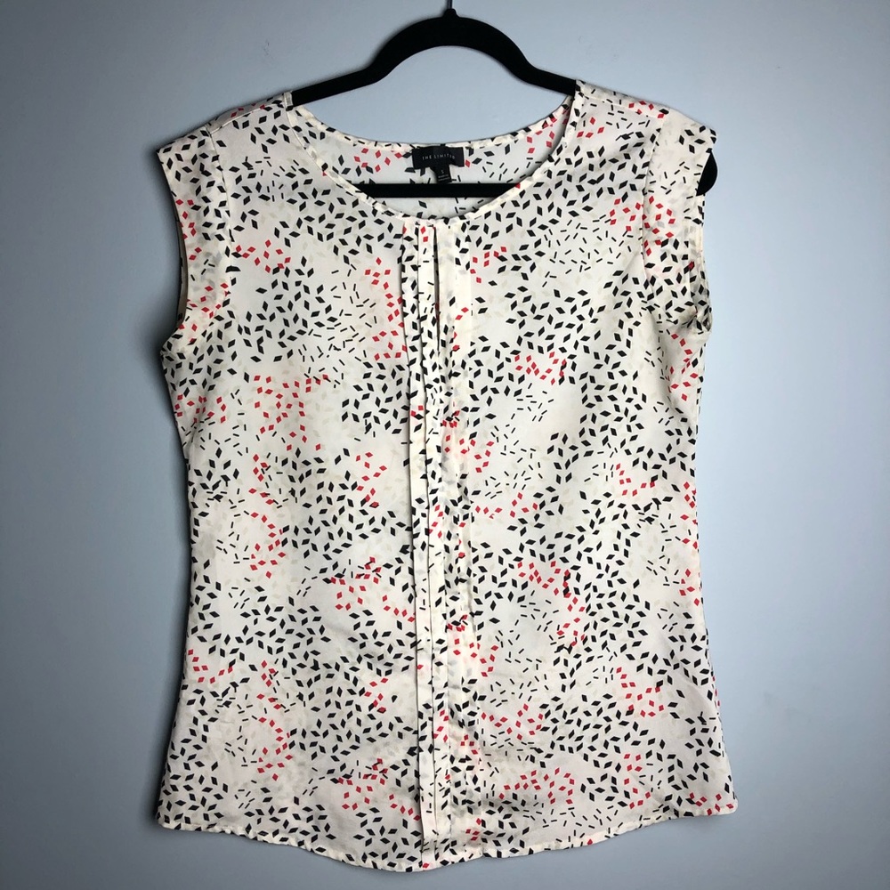 Used pretty top with cute little diamonds!